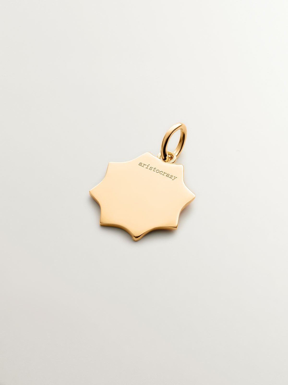 18K yellow gold plated 925 sterling silver charm with star-shaped yellow enamel initial C