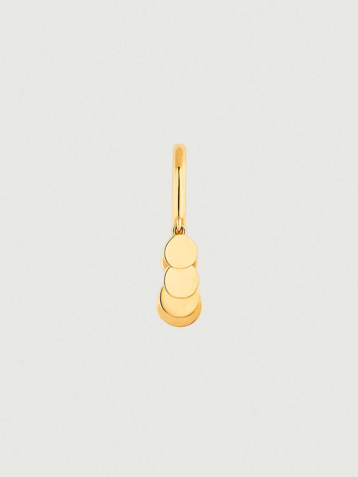 Individual 9K yellow gold earring with hanging spheres.