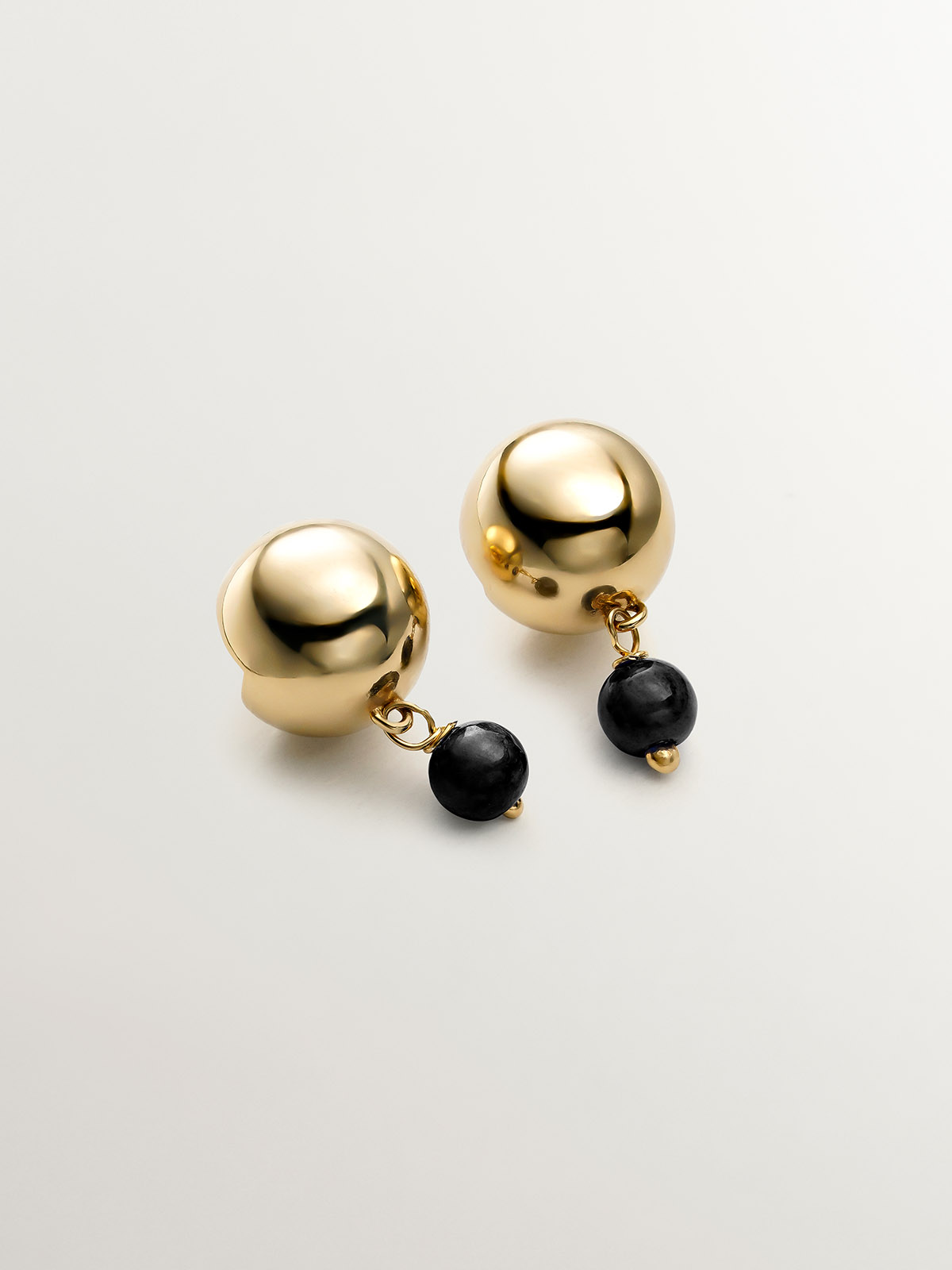 925 silver earrings bathed in 18k yellow gold with black ónix