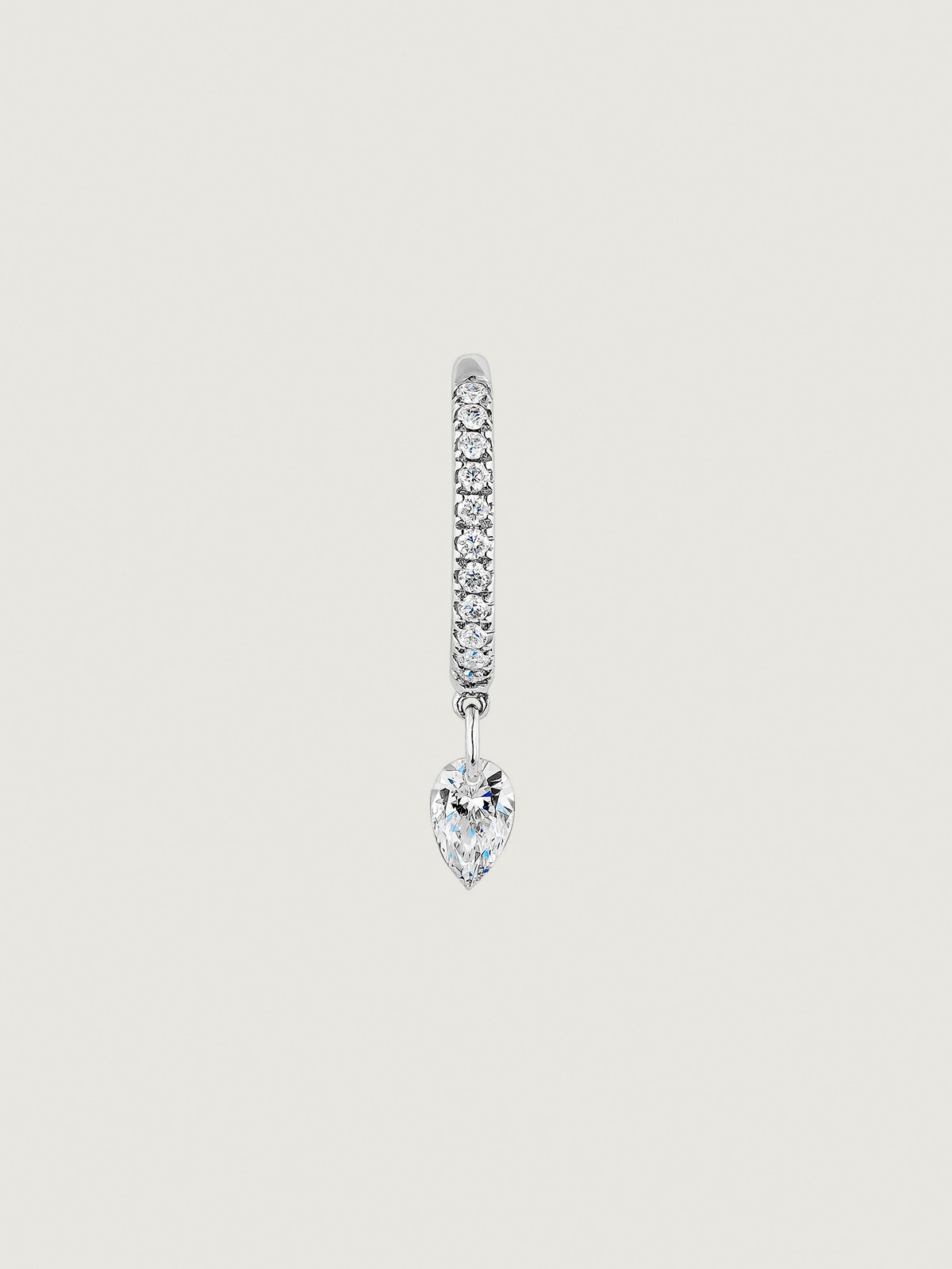 Individual small hoop earring made of 18K white gold with diamonds.