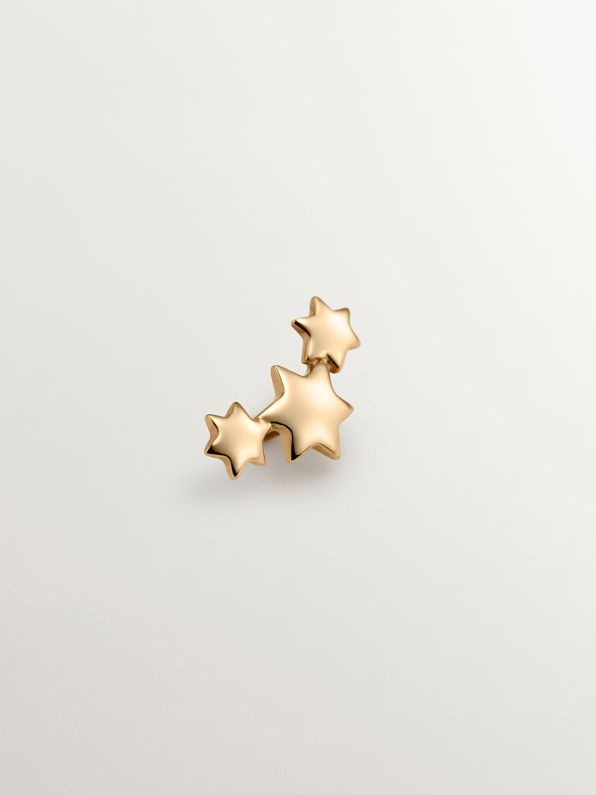 Pendiente individual de oro amarillo de 9K con estrellas
