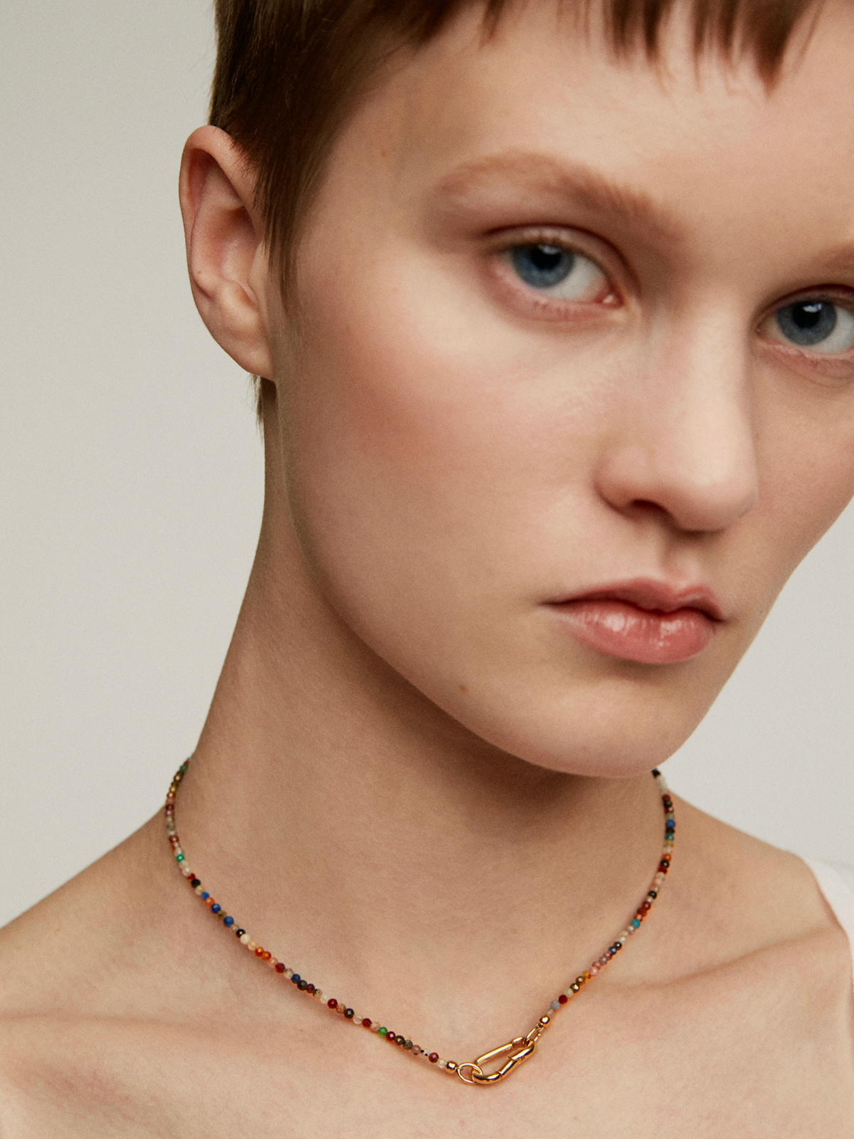 925 Silver necklace, gold plated in 18K yellow gold with multicolored stone beads.