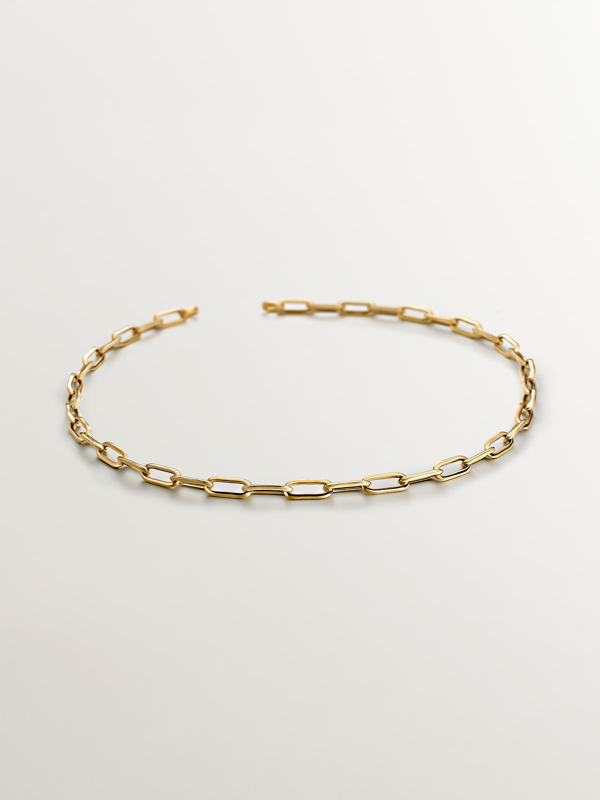 Chain of rectangular links made of 925 silver, coated in 18K yellow gold