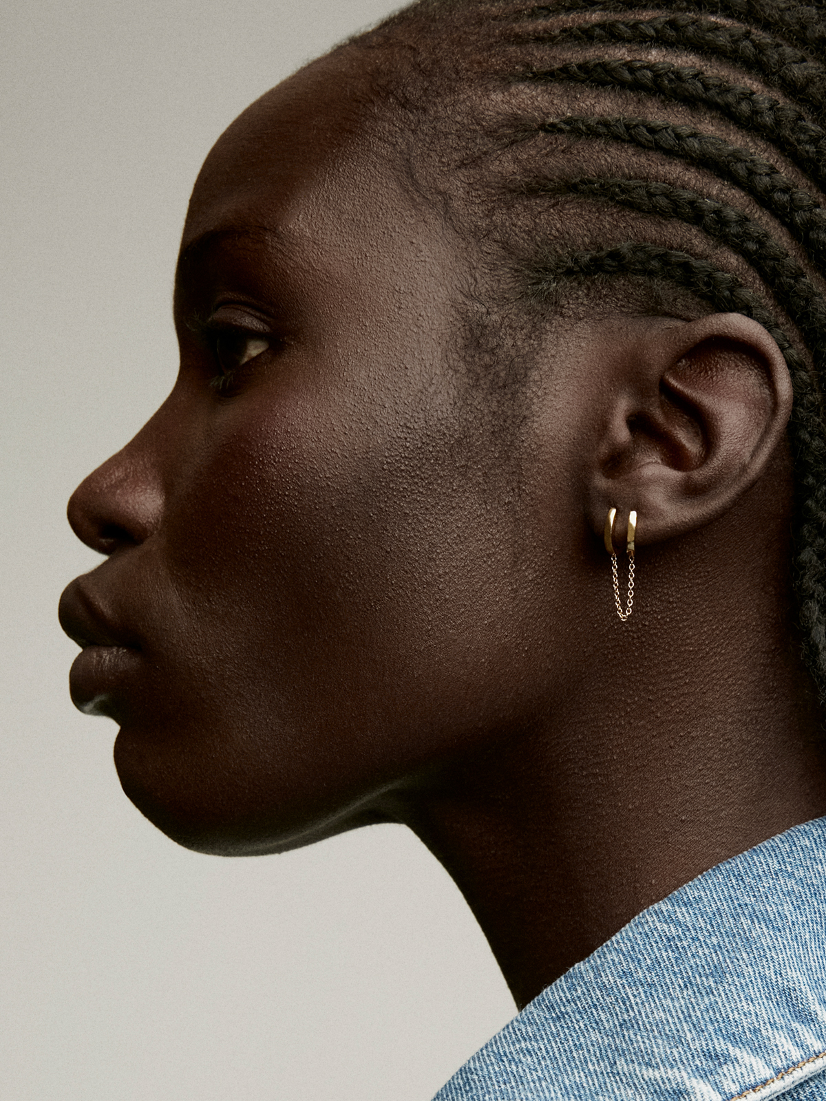 Individual climbing earring made from 925 silver, bathed in 18K yellow gold with a double hoop.