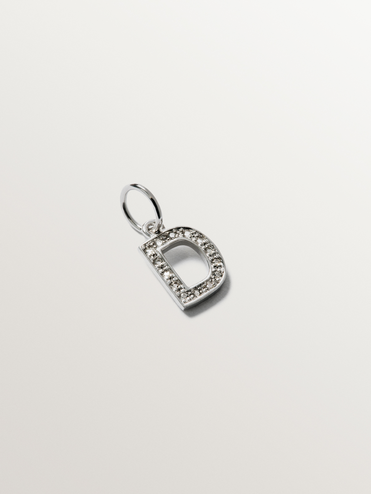 Charm de plata 925 y topacios blancos inicial D