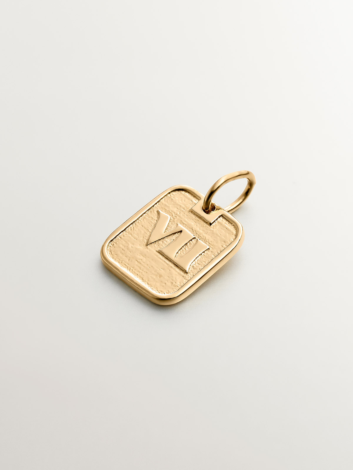 925 silver charm bathed in 18k yellow gold with number 7