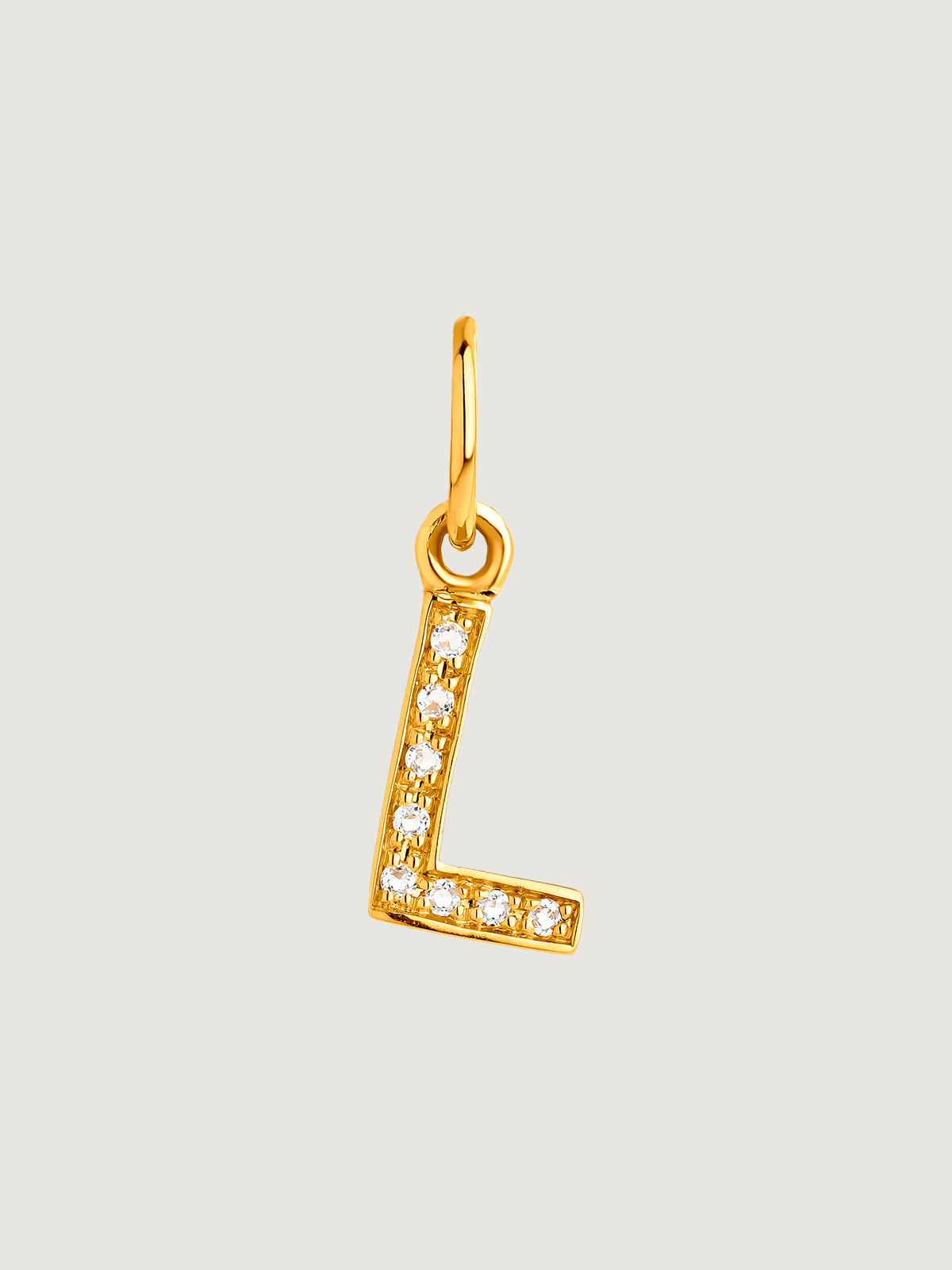925 Sterling silver charm bathed in 18K yellow gold and white topaz with the initial L.