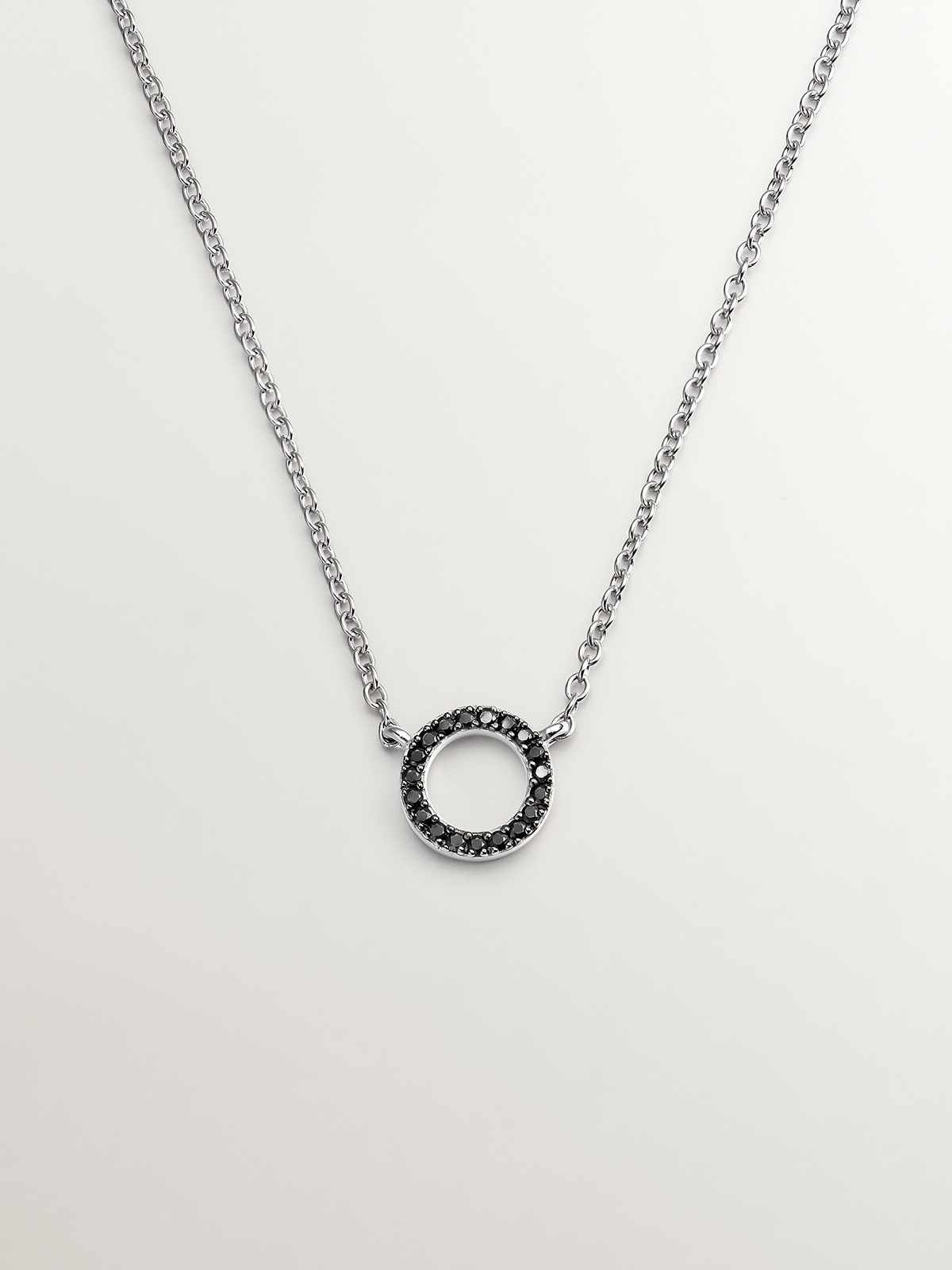 925 Silver pendant with circle of black spinels