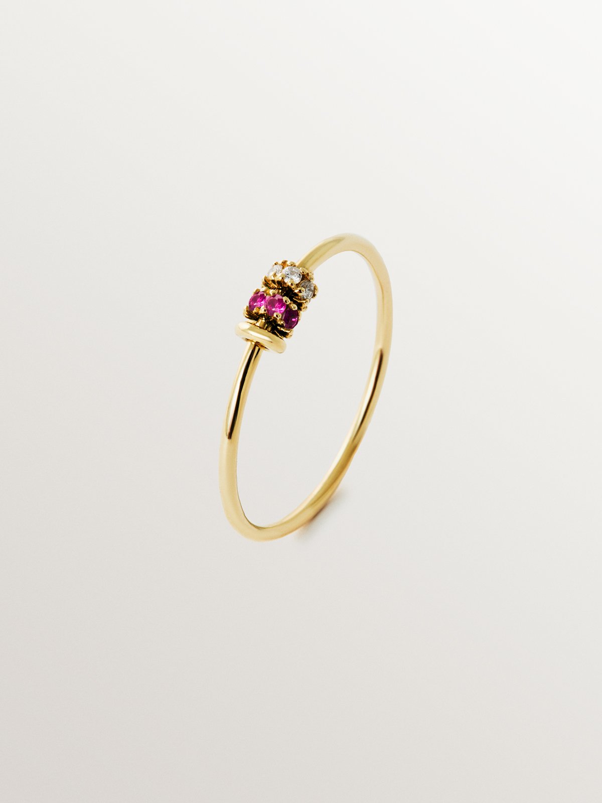 9K yellow gold ring with rubies and diamonds