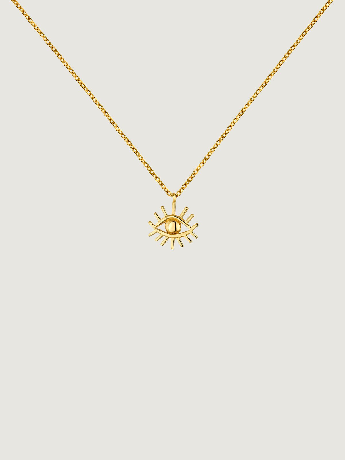 A 925 silver pendant bathed in 18K yellow gold with an eye.