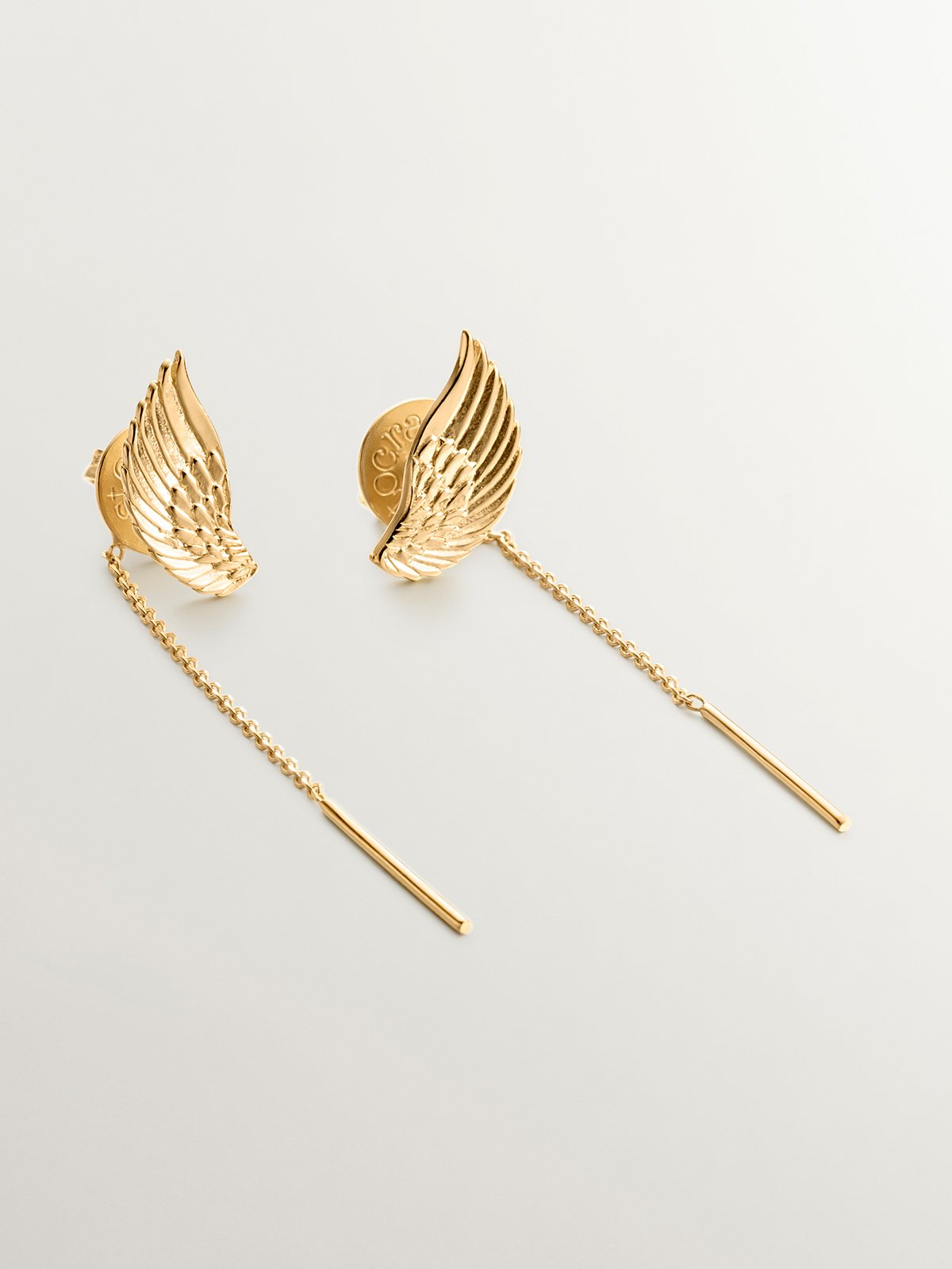 Long 925 silver earrings bathed in 18K yellow gold with wings