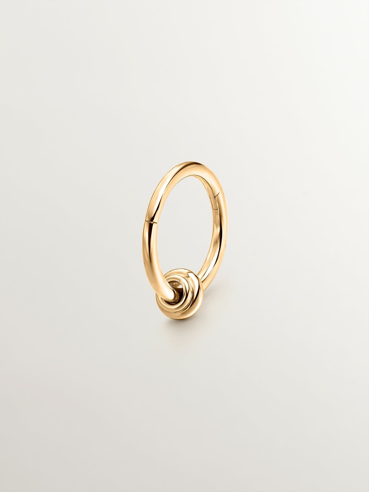 Individual 9K yellow gold hoop earring with a small ball.