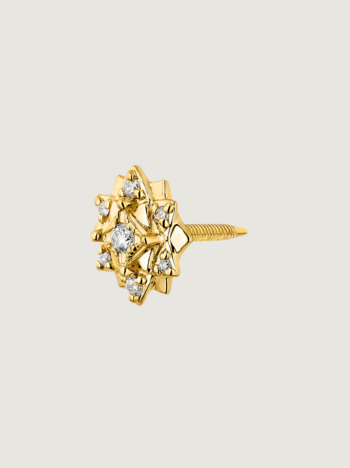 Individual 9K yellow gold earring with diamonds and flower.