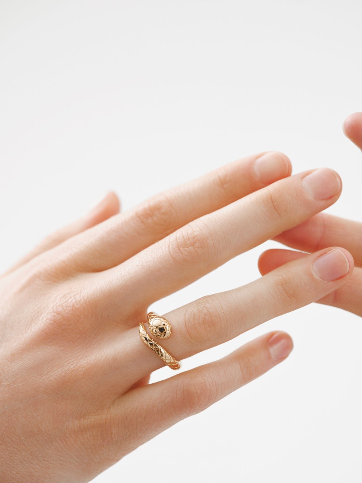 925 Silver ring bathed in 18K yellow gold in the shape of a snake