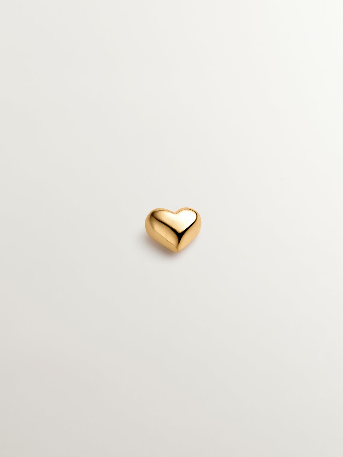 Piercing de oro amarillo de 18K con forma de corazón