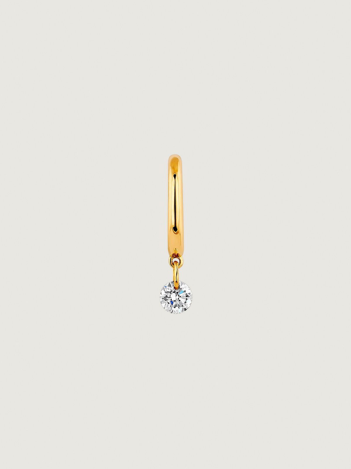 Individual small hoop earring made of 18K yellow gold with a 0.08 cts diamond.