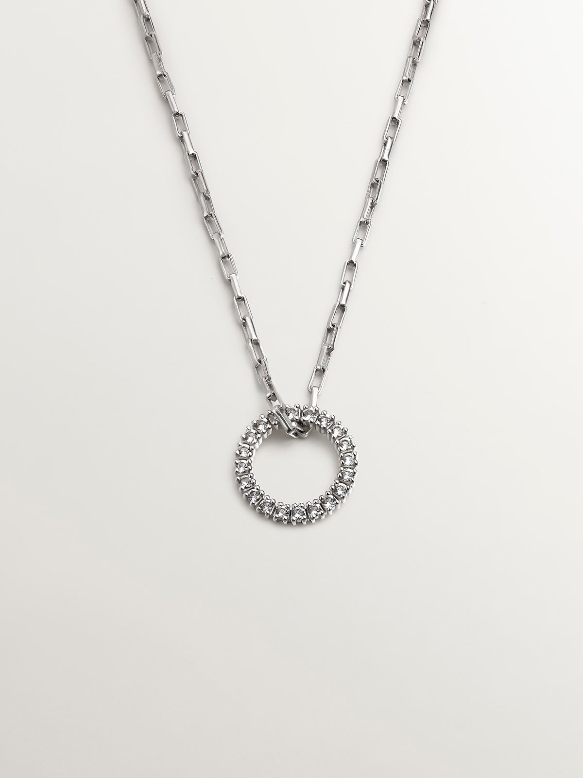 925 Silver pendant with circle of white topazes.