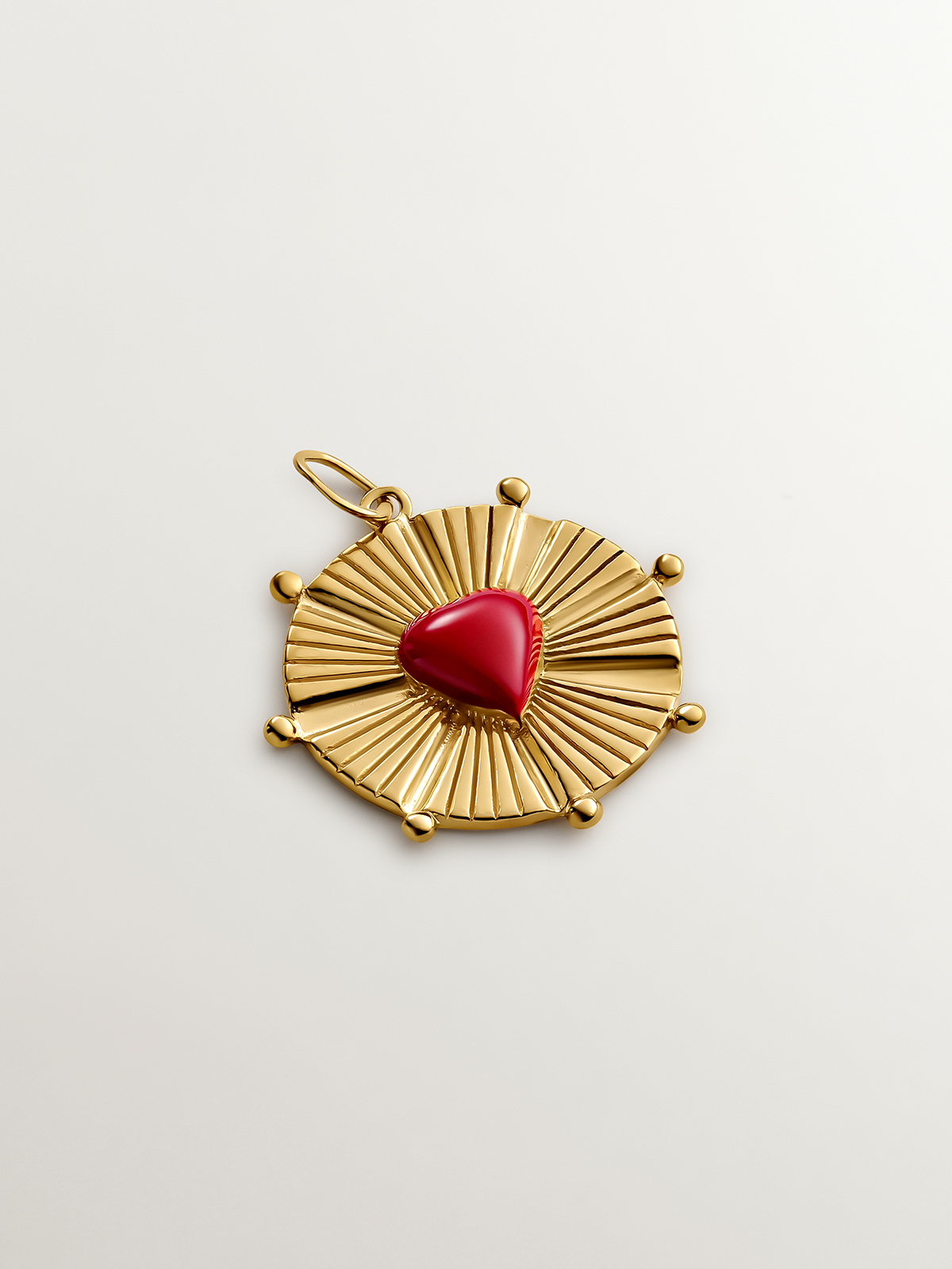 925 Silver charm bathed in 18K yellow gold with enamel heart.