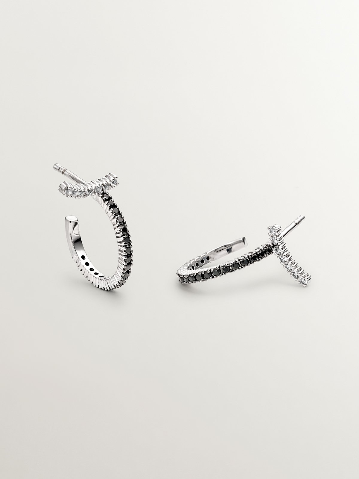 925 Silver hoop earrings with white topazes and black spinels.
