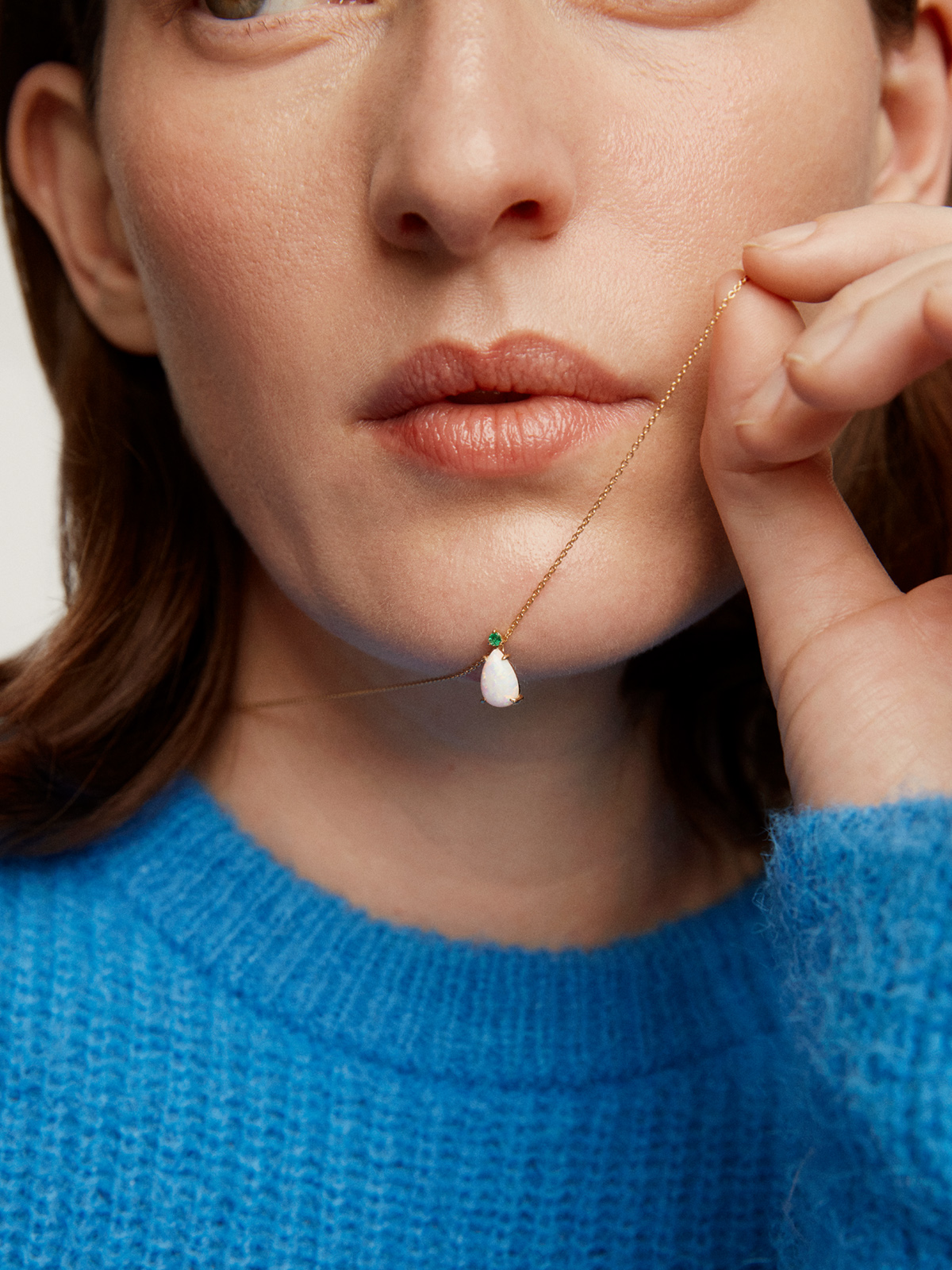 18K yellow gold necklace with white opal and emerald.