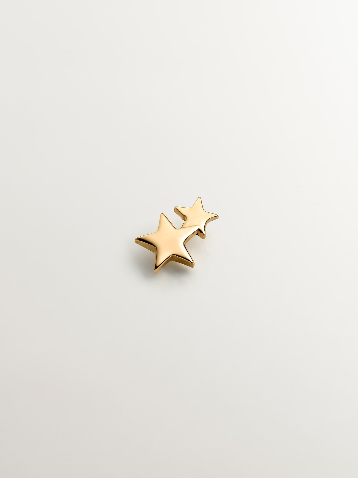 Individual small earring made of 925 silver bathed in 18K yellow gold with stars
