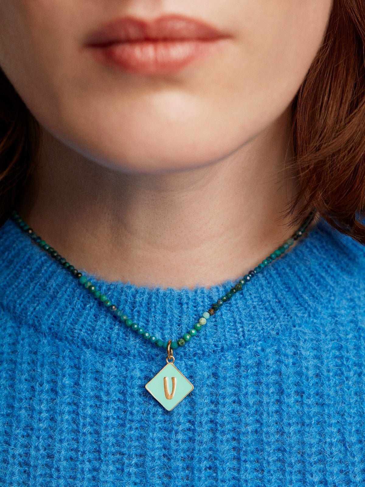 18K yellow gold plated 925 sterling silver charm with V initial and turquoise enamel in the shape of a diamond