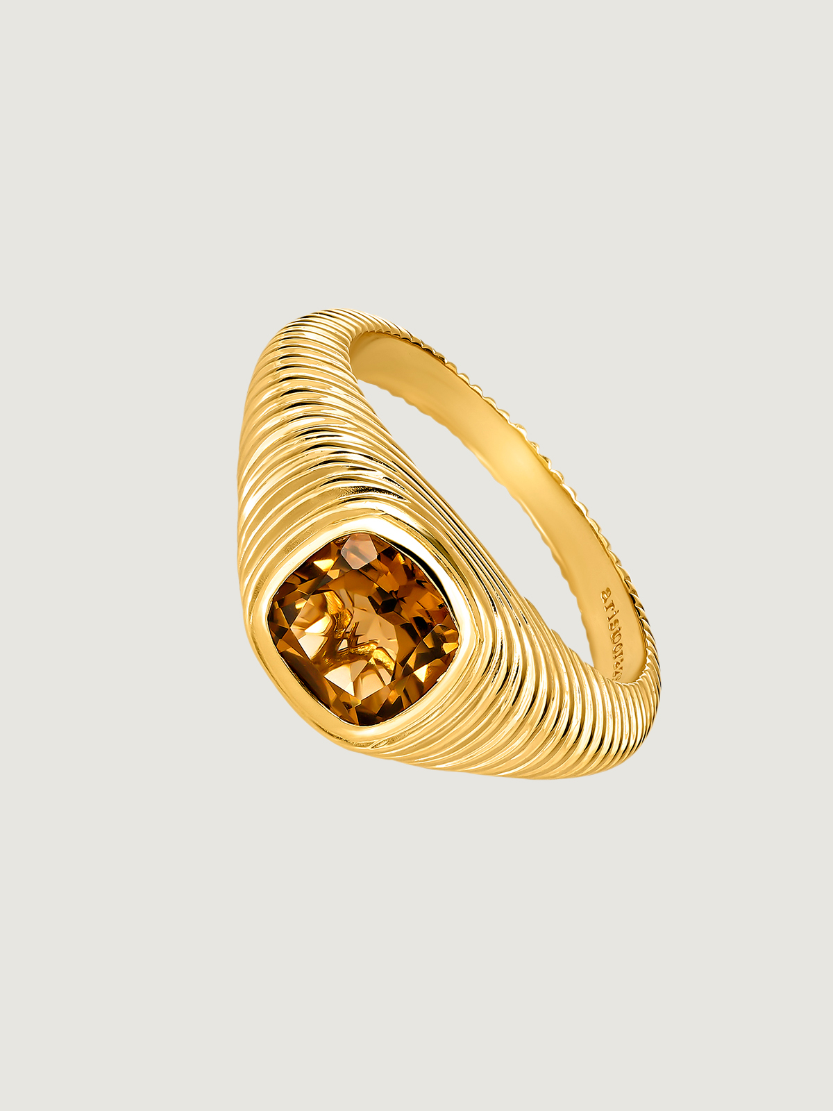 925 Silver signet ring bathed in 18K yellow gold with brown quartz and fluted texture.