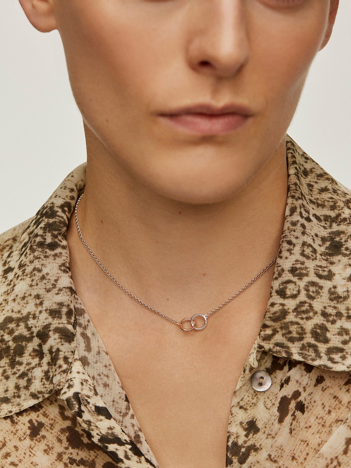 925 Sterling Silver pendant and 925 Sterling Silver pendant coated in 18K rose gold with interlocking circles.