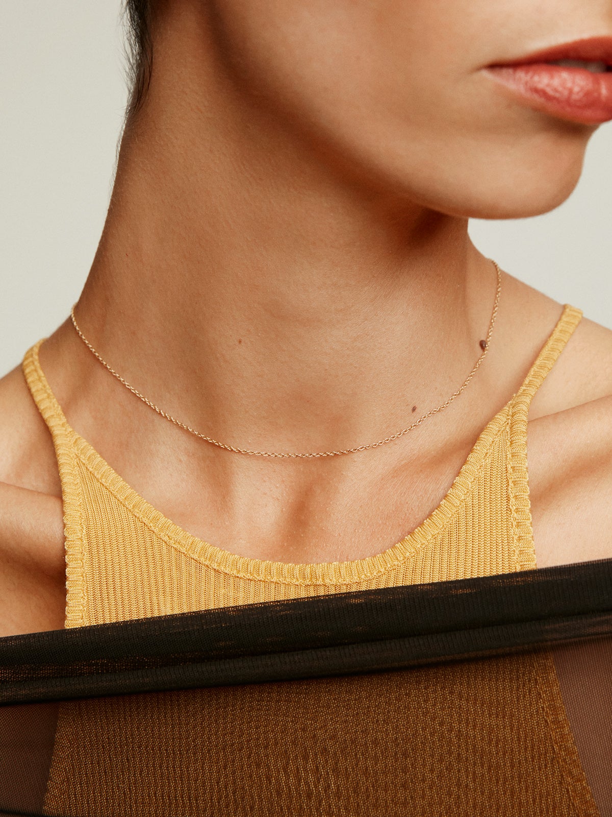 Simple adjustable 925 silver chain bathed in 18K yellow gold.