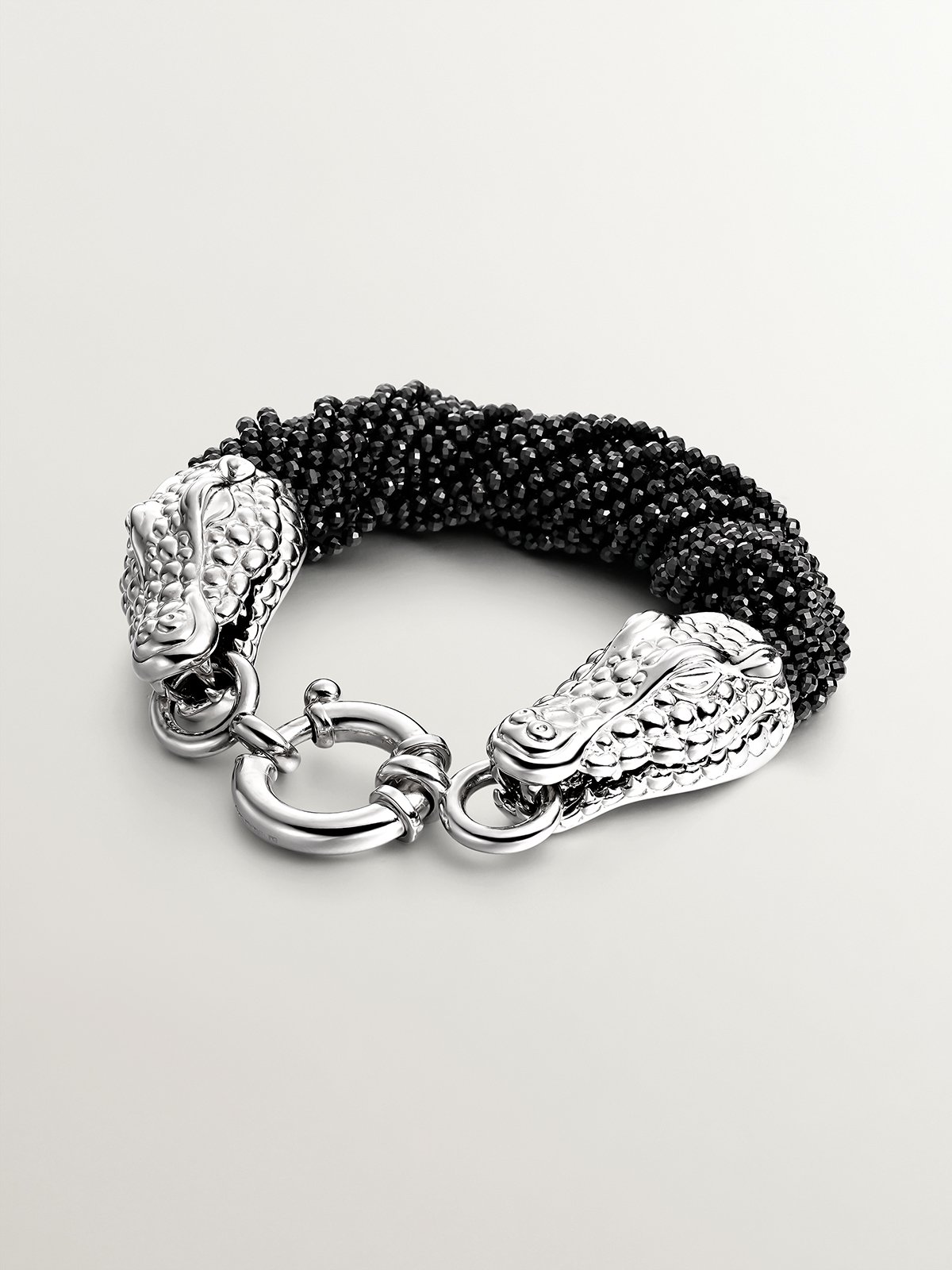 925 silver bracelet and black spinelas shaped like crocodile heads