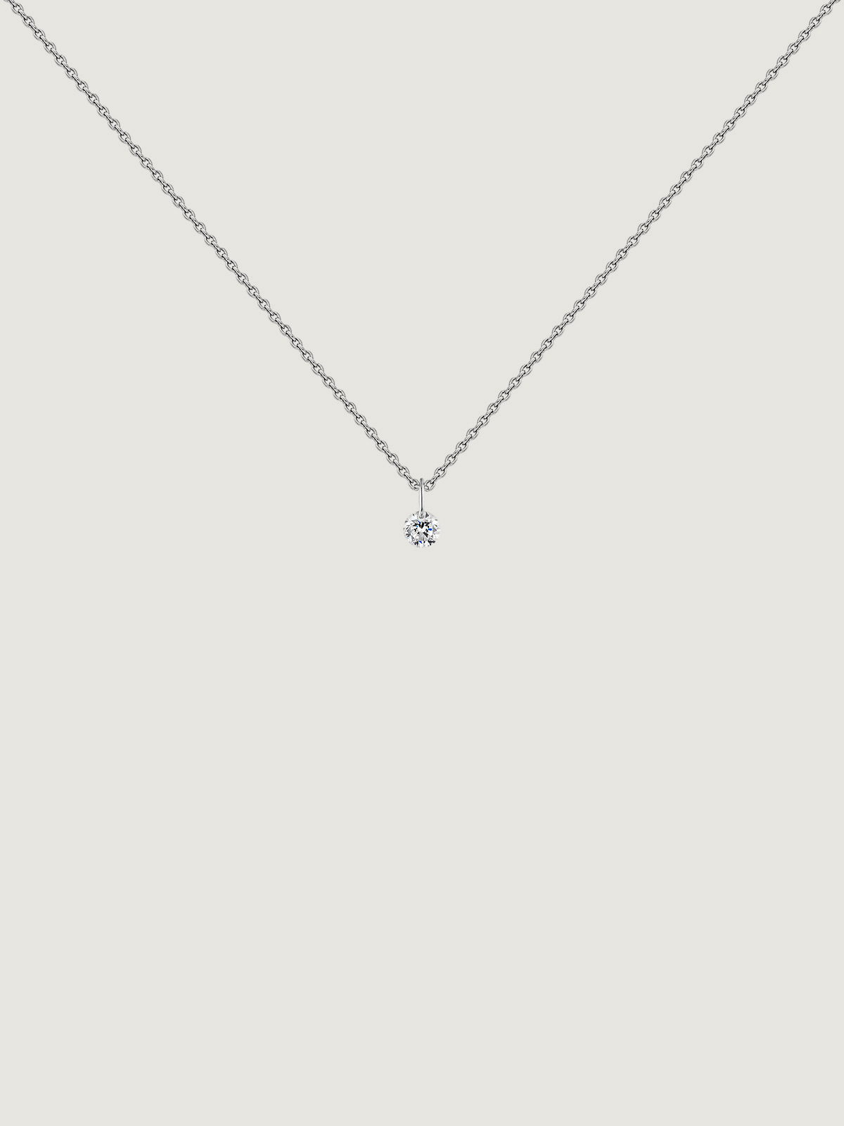 18K white gold pendant with diamond.