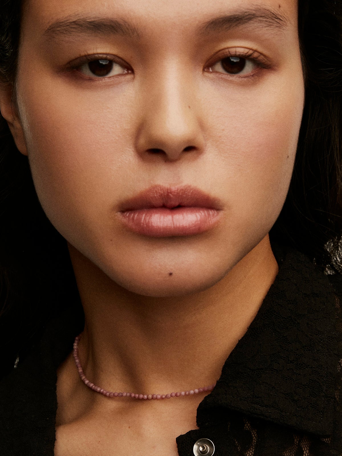 925 silver necklace bathed in 18K yellow gold with pink rhodonite beads.