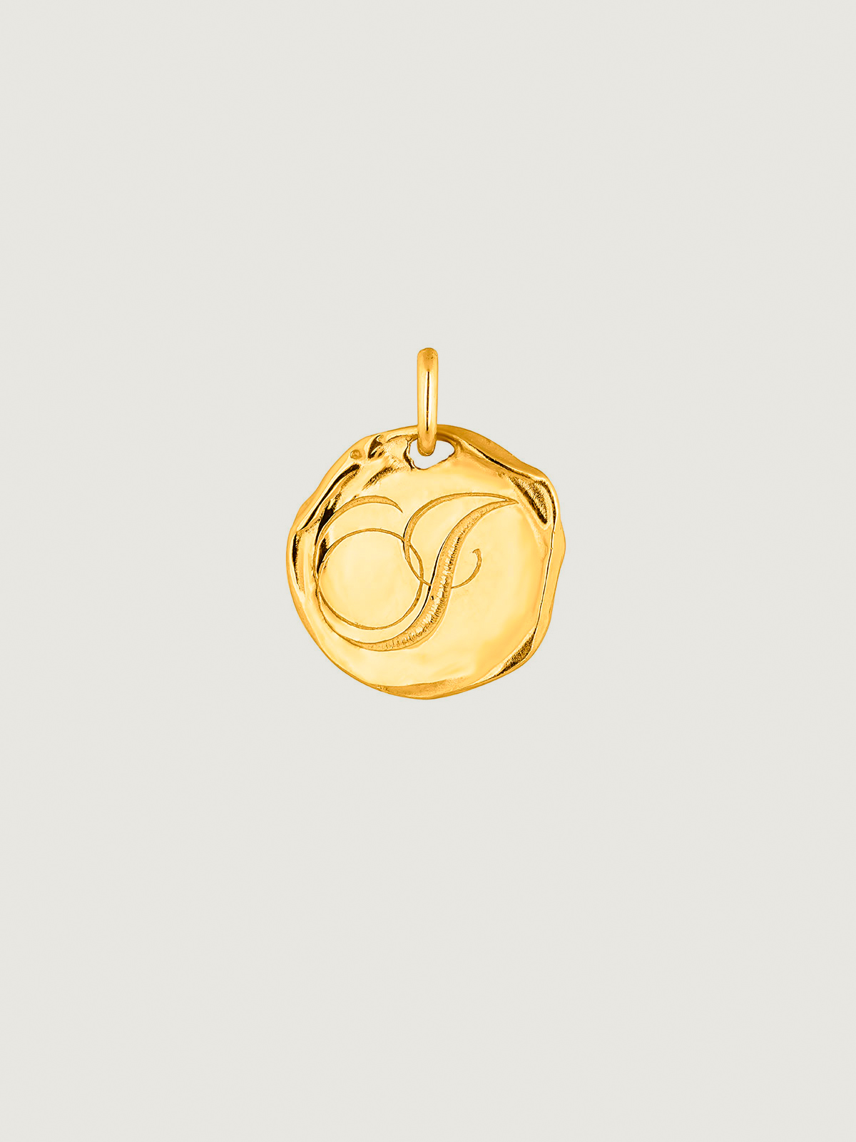 Handcrafted charm made of 925 silver, bathed in 18K yellow gold with initial J.