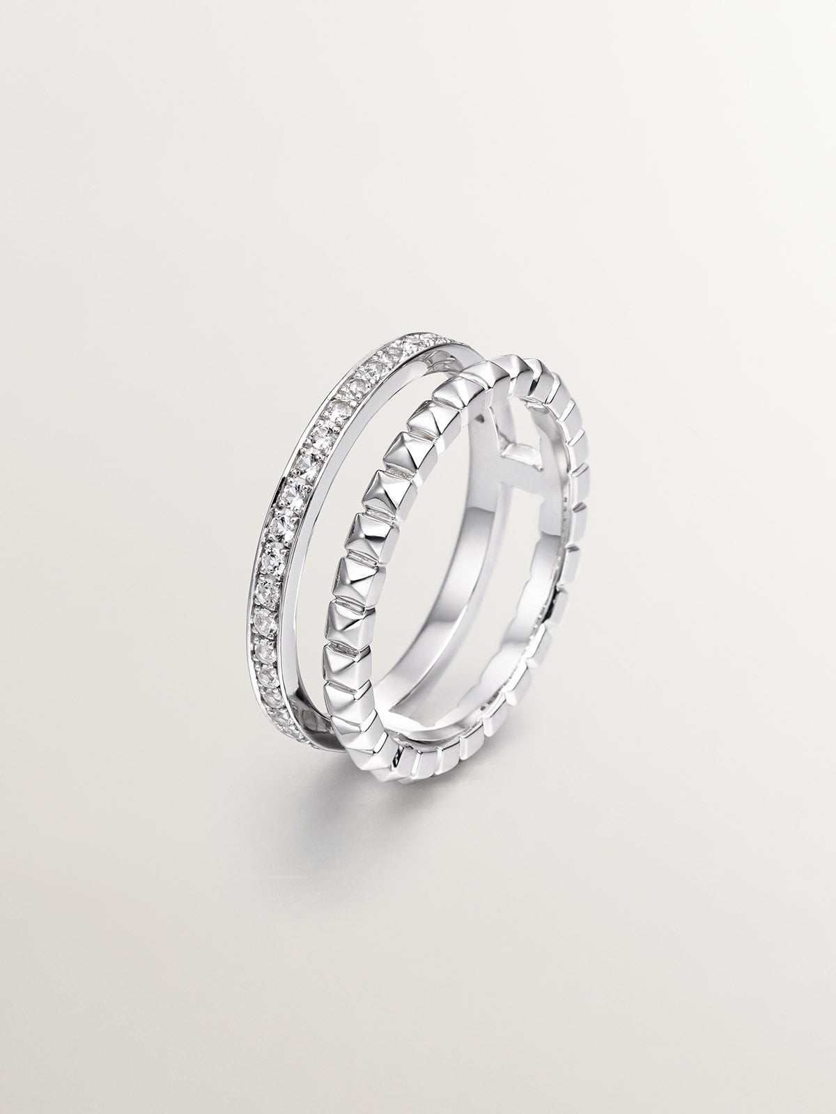 Anillo doble de plata 925 con relieve y topacios blancos