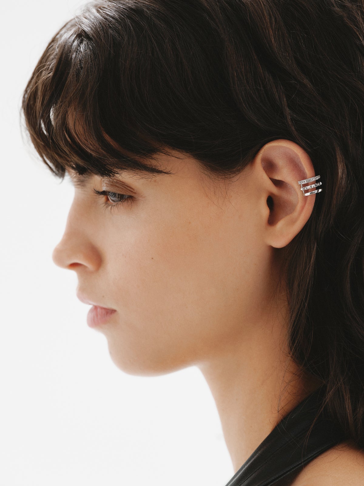 925 Silver Earcuff with embossing and white topazes