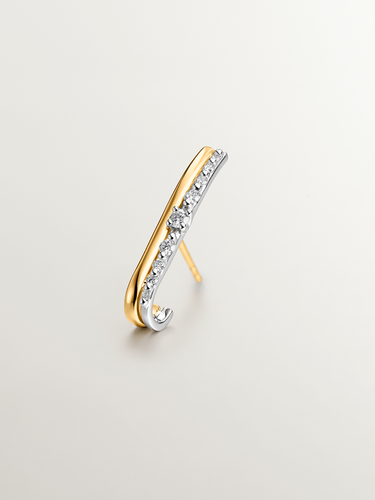 Right individual climber earring made of 18K yellow and white gold with diamonds.