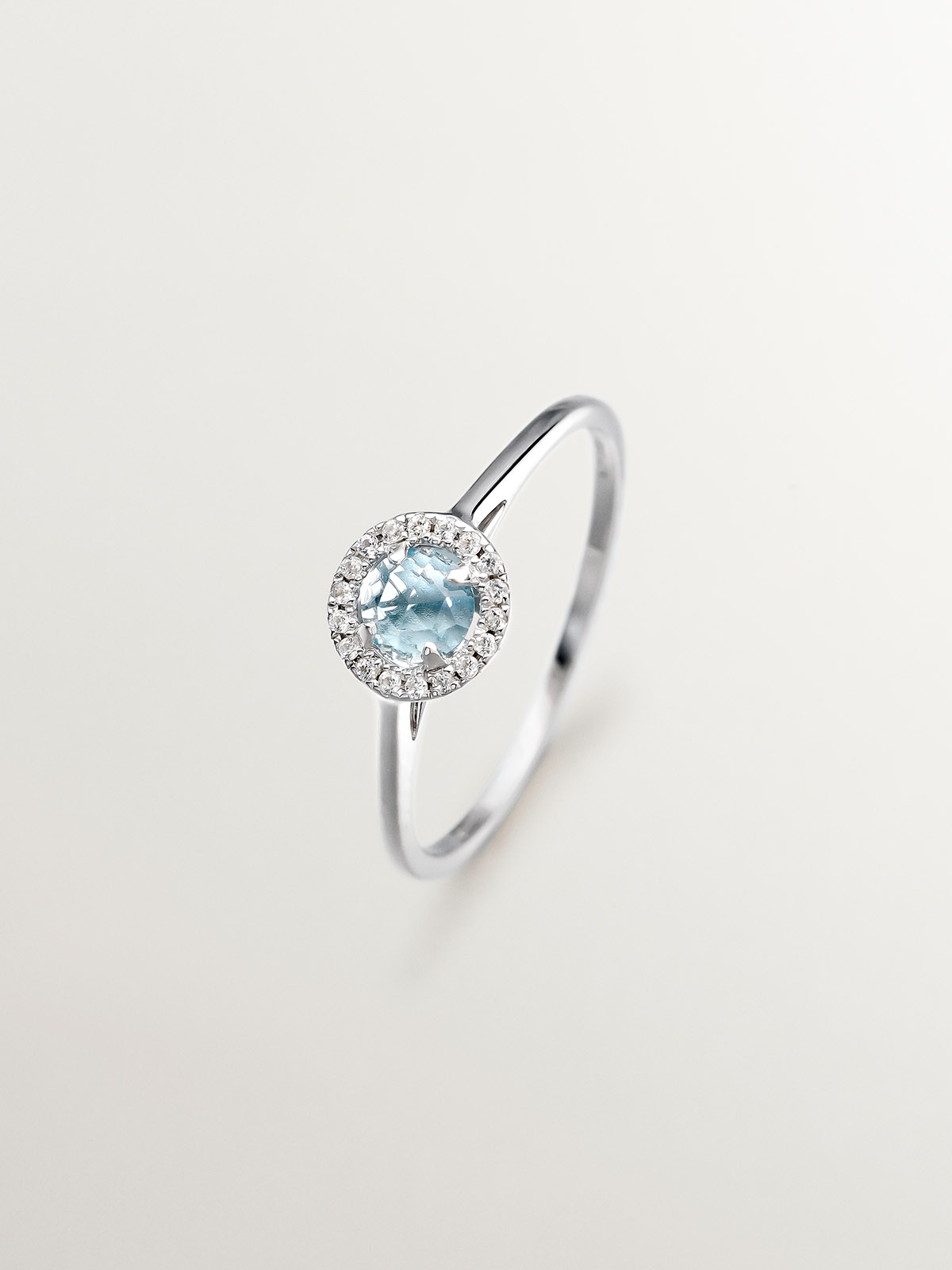 925 Silver ring with blue topaz and white sapphires
