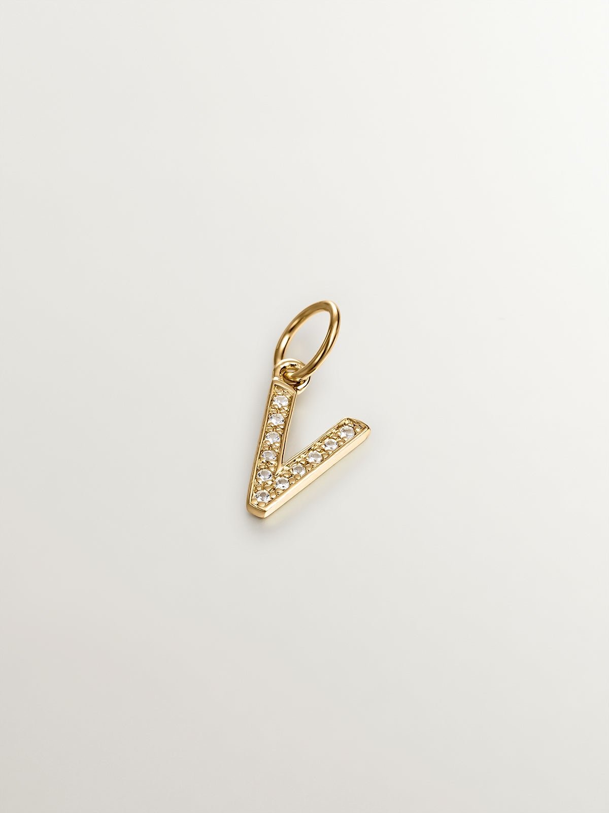 Charm en argent 925 plaqué en or jaune 18K et topazes blanches initial V
