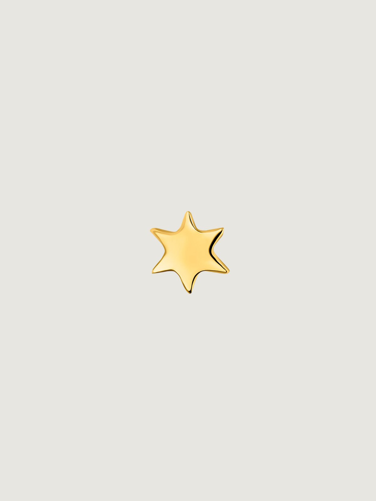 Piercing de oro amarillo de 18K con forma de estrella