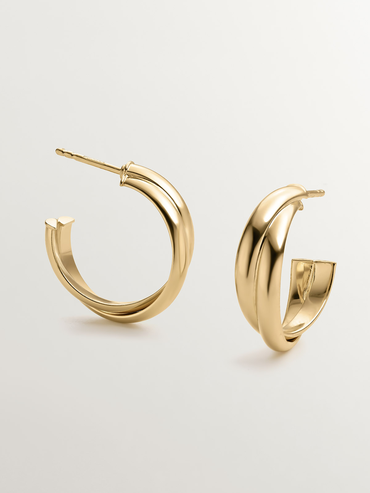 Medium double hoop earrings made of 925 silver coated in 18K yellow gold