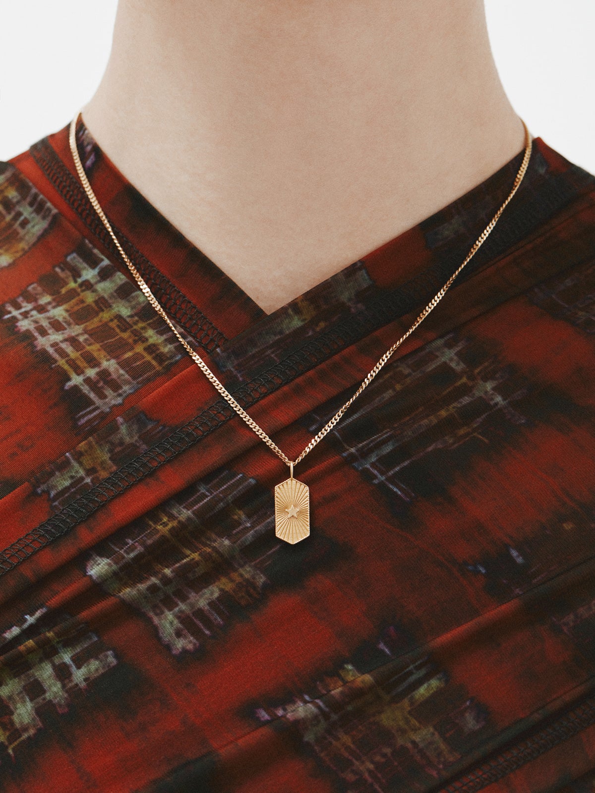 925 silver charm bathed in 18k yellow gold with orange enamel