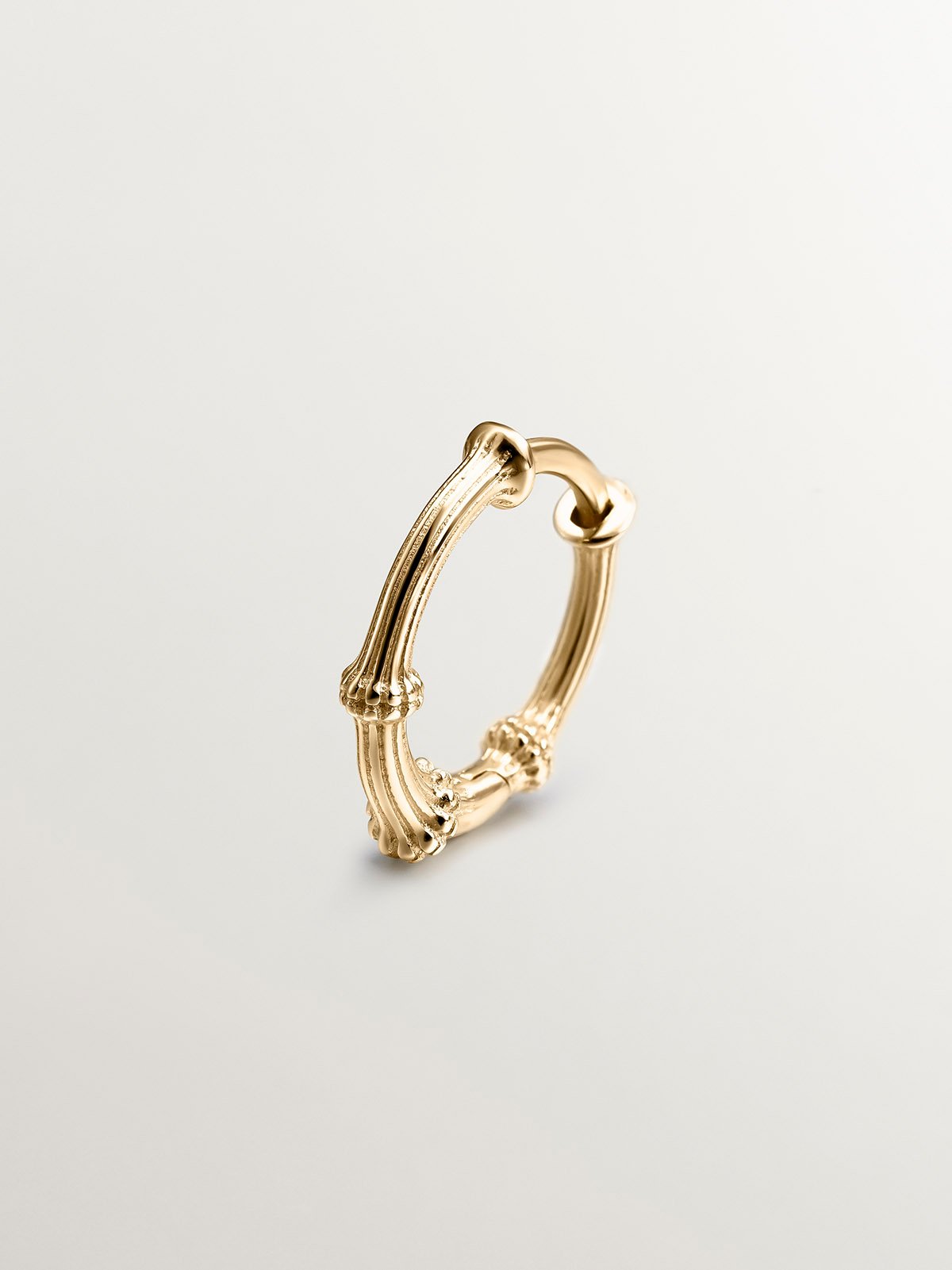 Individual 9K yellow gold hoop earring with beads