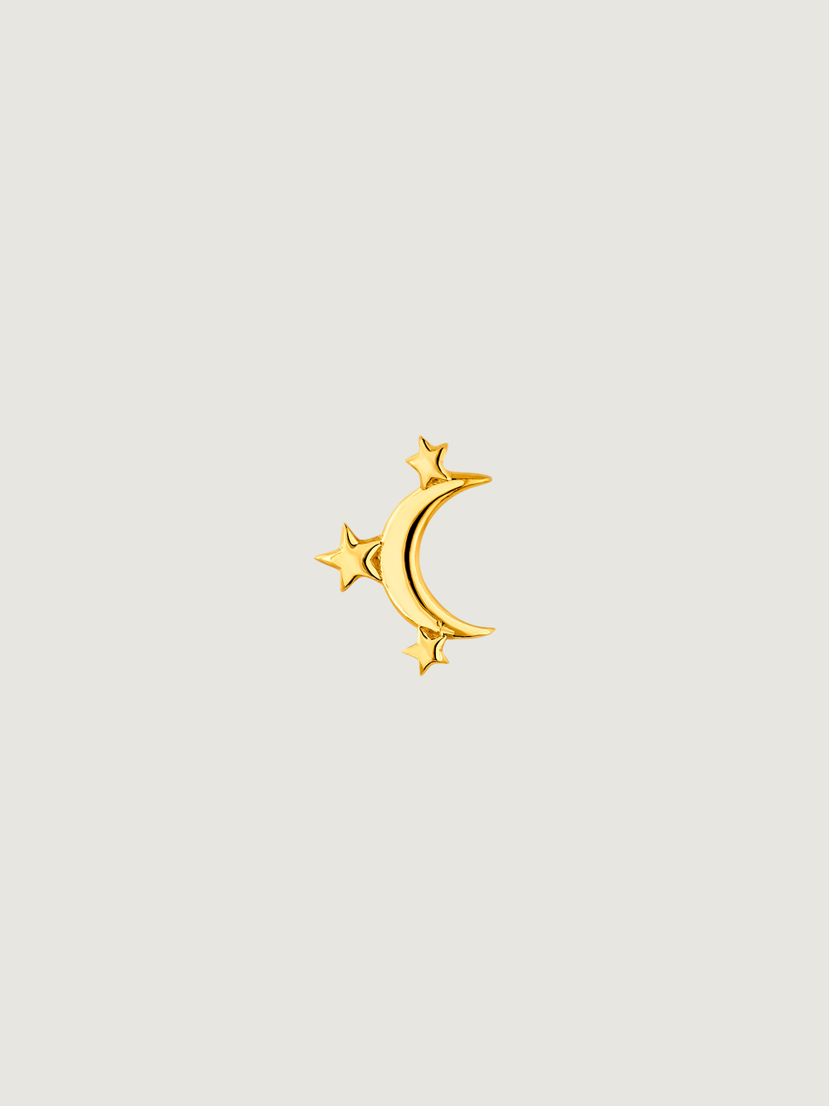 Single 925 silver earring bathed in 18K yellow gold with moon and stars.