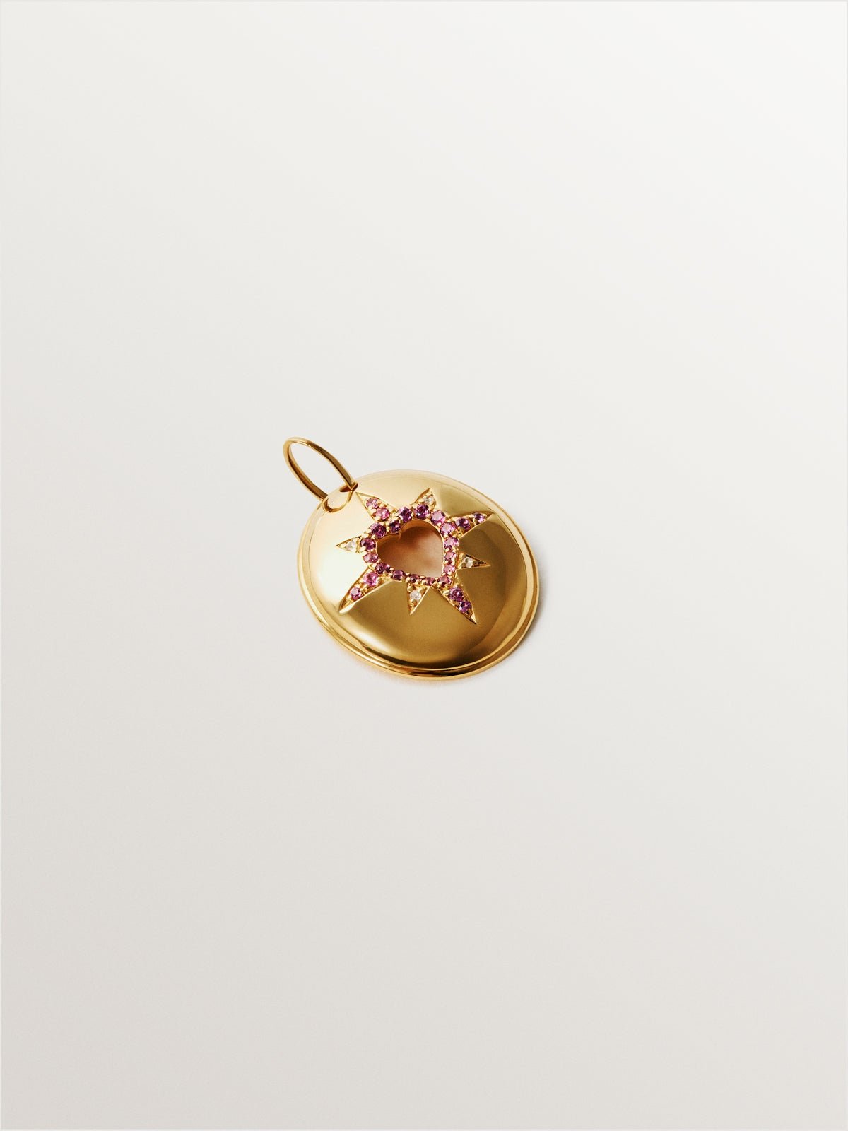 18K yellow gold plated 925 silver charm with purple rhodolites, white topaz and heart shape.