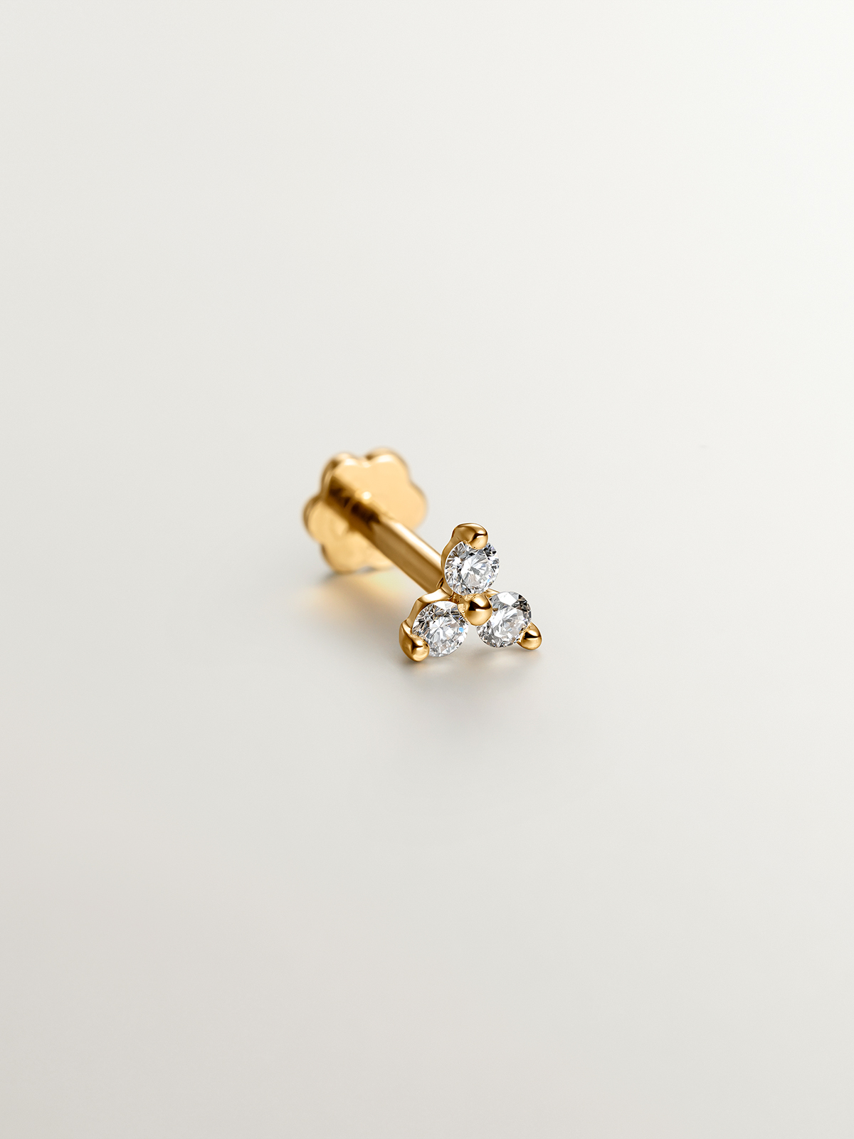 18K yellow gold piercing with 0.06 cts diamond clover