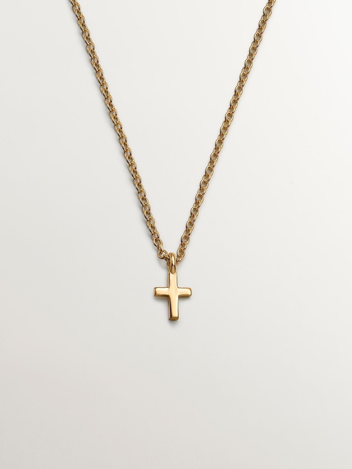 925 silver pendant, dipped in 18K yellow gold with a cross.