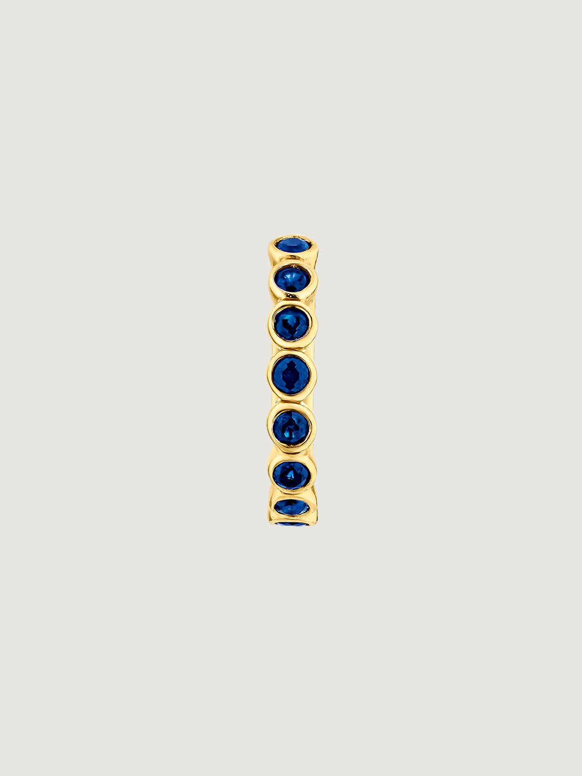 Pendiente individual pequeño de aro de oro amarillo de 9K con zafiros azules