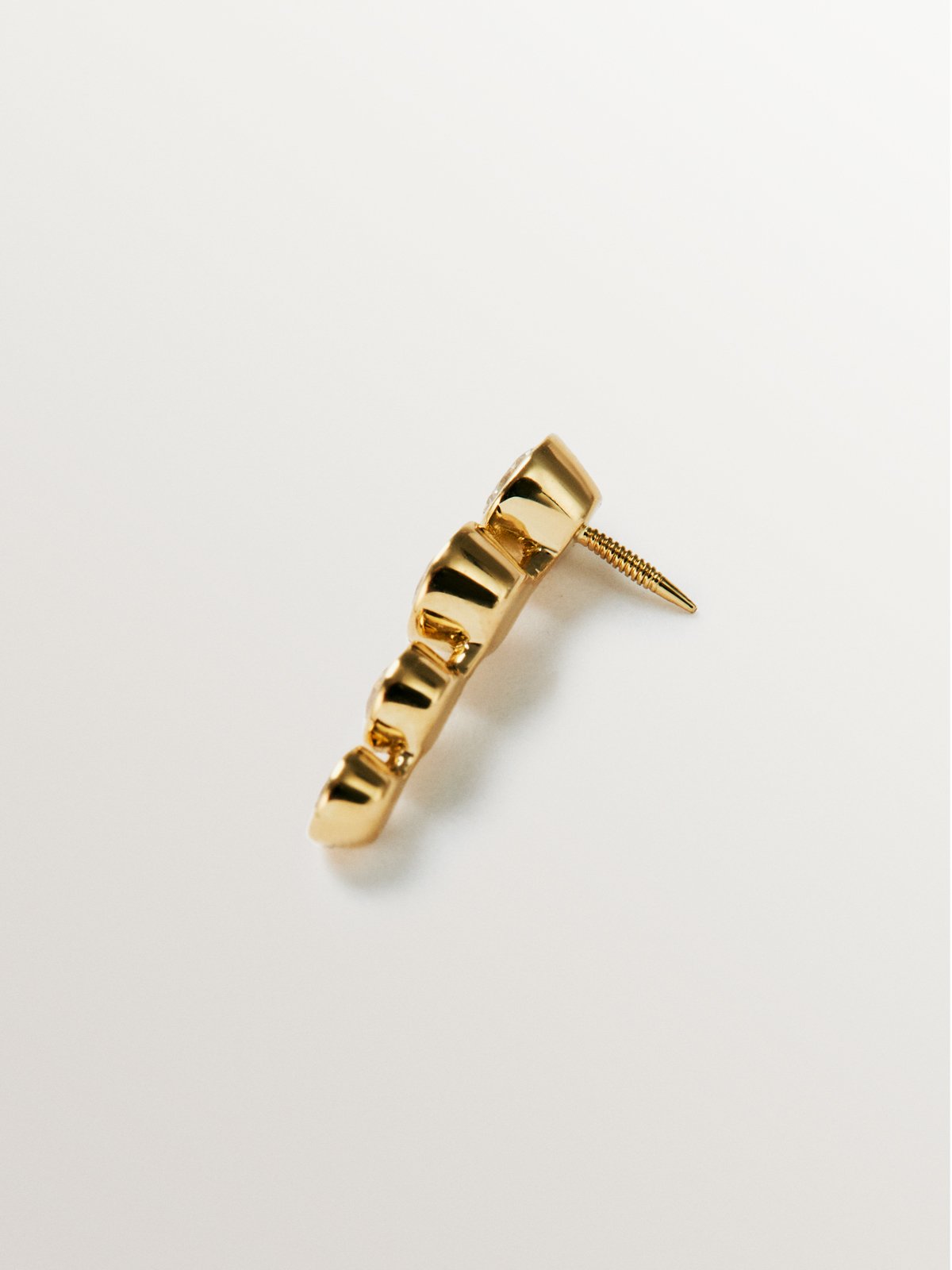 Piercing de oro amarillo de 18K y diamantes en talla brillante