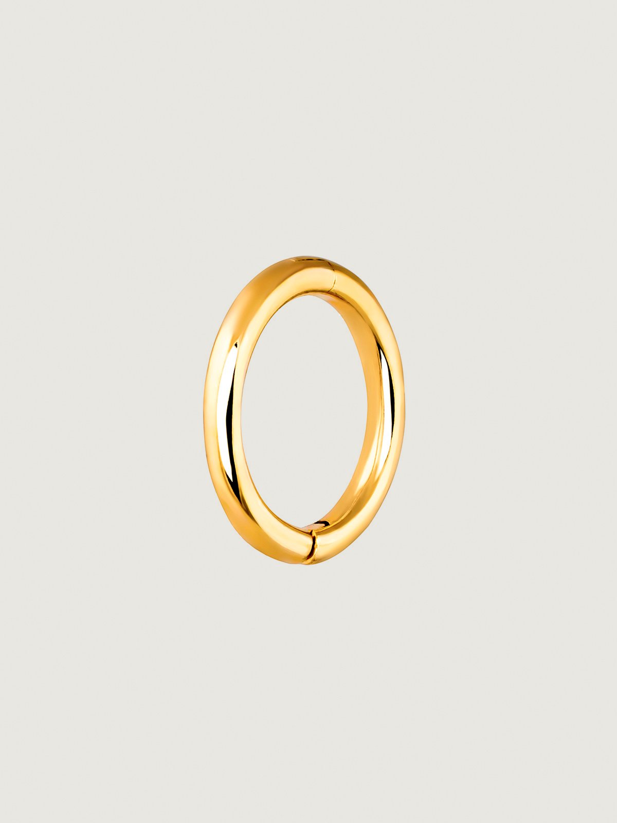 Small individual 9K yellow gold hoop earring.