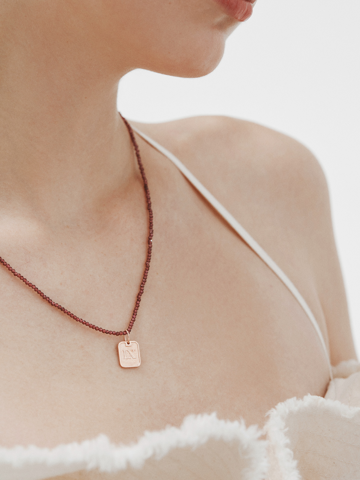 Charm de plata 925 bañada en oro rosa de 18K con número 9